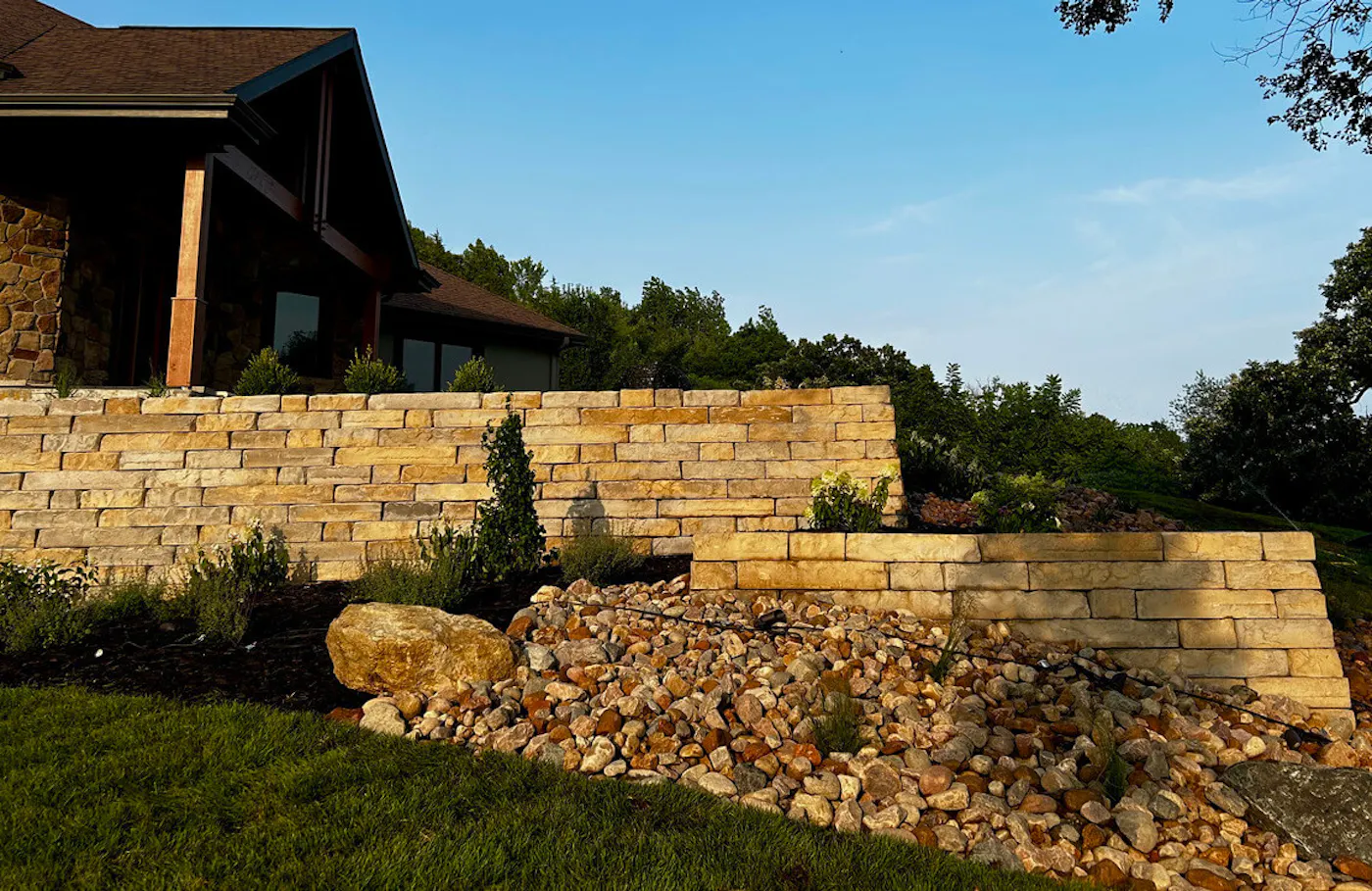 tiered kodah wall in front of house