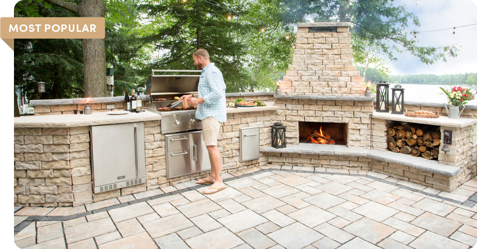 two people grilling using dimensional walls for outdoor grill area