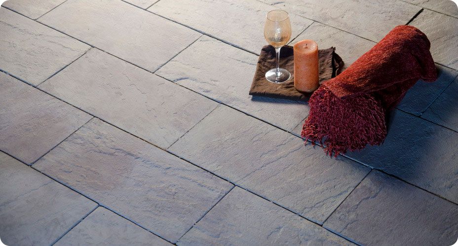 linear flagstone with candle and wine glass