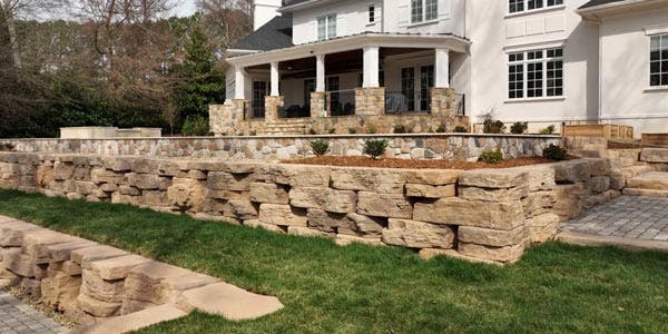 image of outcropping walls in front of house