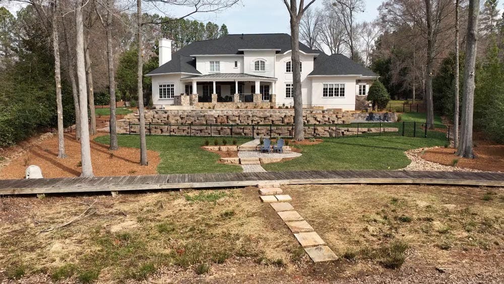 image of outcropping walls in front of house
