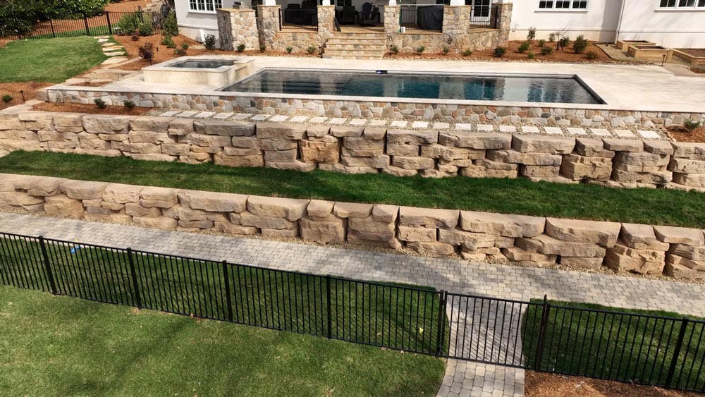 image of outcropping walls in front of house