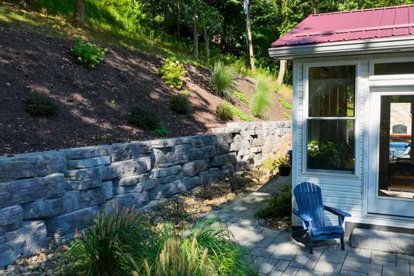 image of outcropping wall next to house