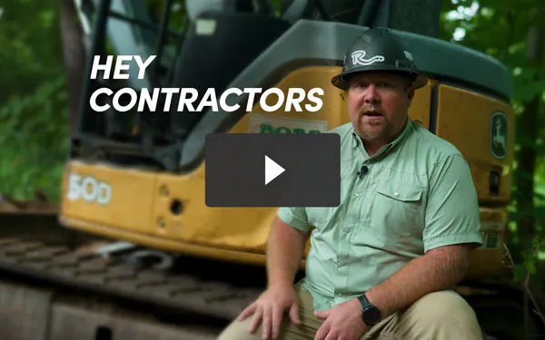 thumbnail image of hardscape nate with skid steer in background