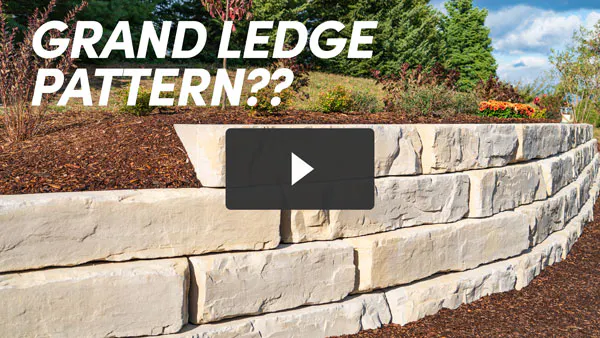 image of base course of grand ledge with level on top of block