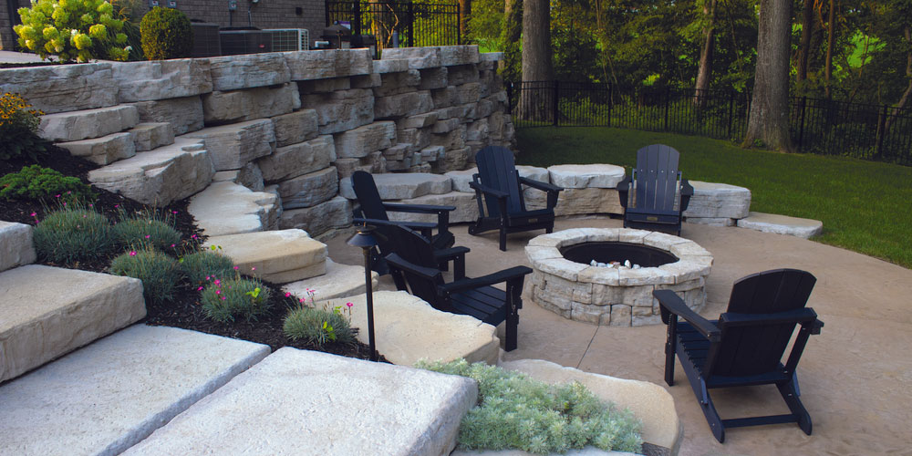image of patio with rosetta outcropping wall, and belvedere fire pit