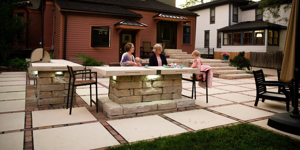 people around backyard table