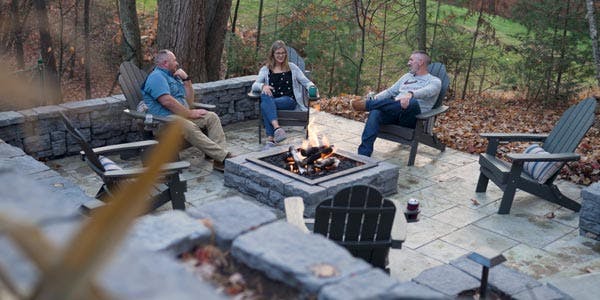 image of people around firepit in backyard patio