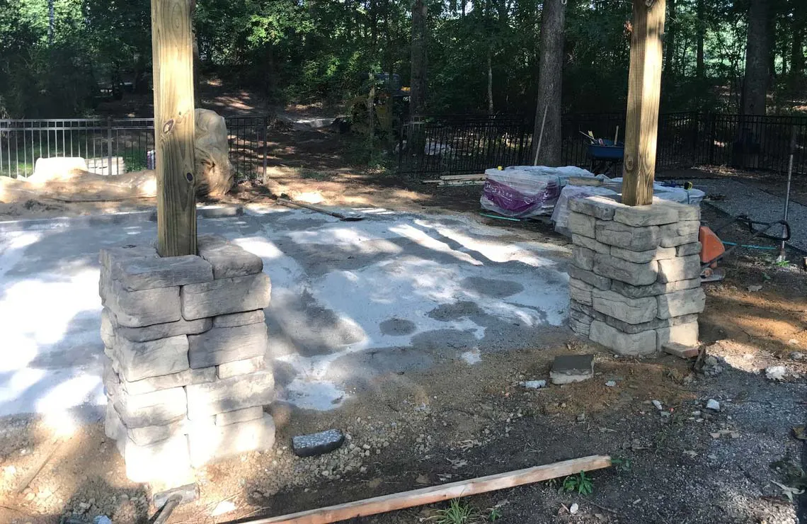 Rosetta Hardscapes Belvedere wall and corner blocks custom designed to create two natural-stone like columns.