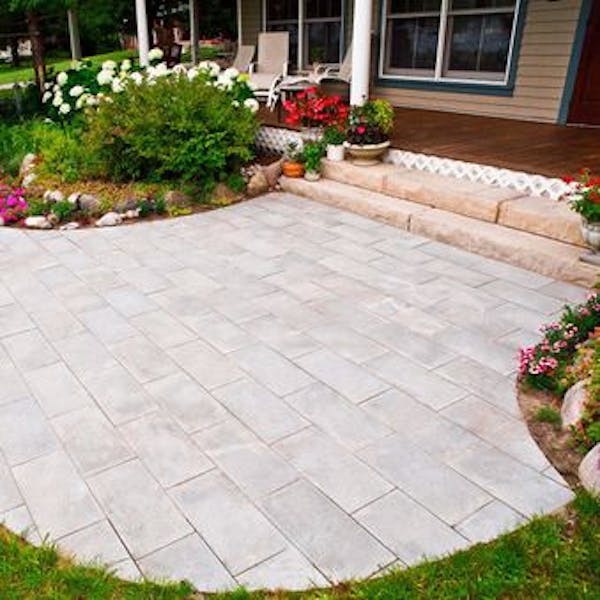 Linear Flagstone pavers on front porch with steps and flowers