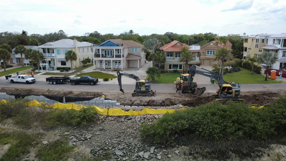 Redi-Rock retaining wall being installed along Inlet Drive as part of the shoreline resiliency project. 