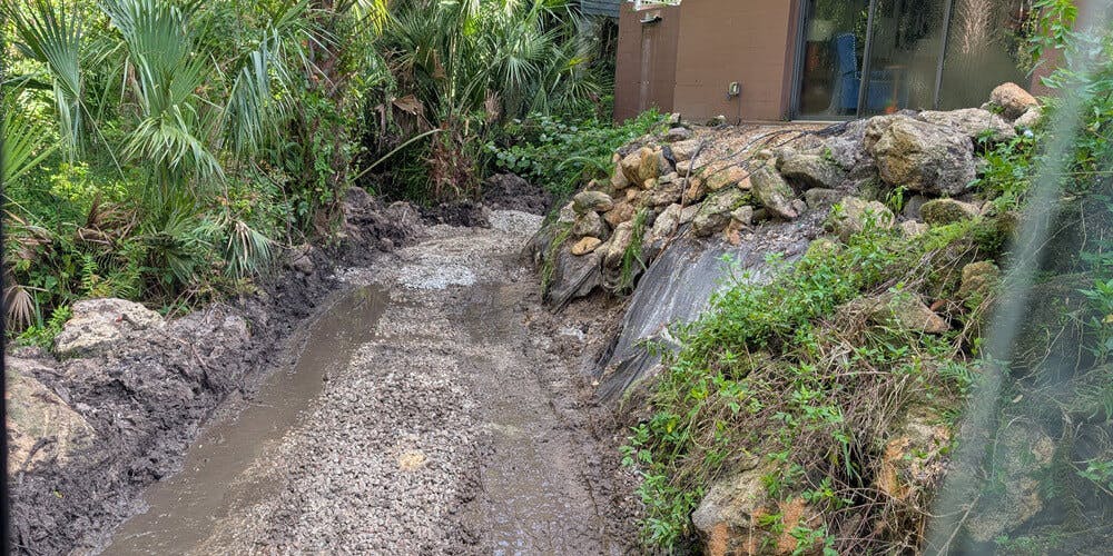 image of steep slope with failed wall