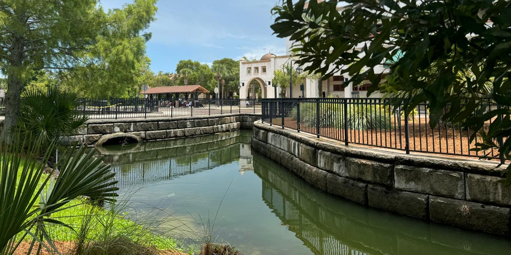 image of retention basin using redi-rock blocks surrounded by plants